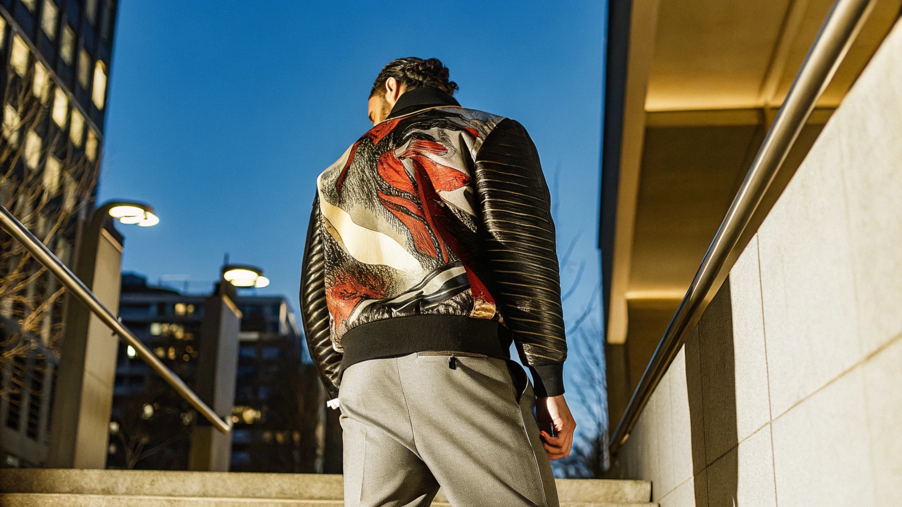 Bold printed jacket with vibrant colors, dynamic patterns, and a sleek silhouette, blending modern streetwear with futuristic aesthetics.